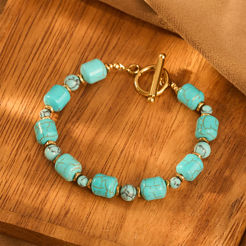 Vintage Boho Armband mit türkisfarbenen Fassperlen und goldfarbenem Knebelverschluss - image 1