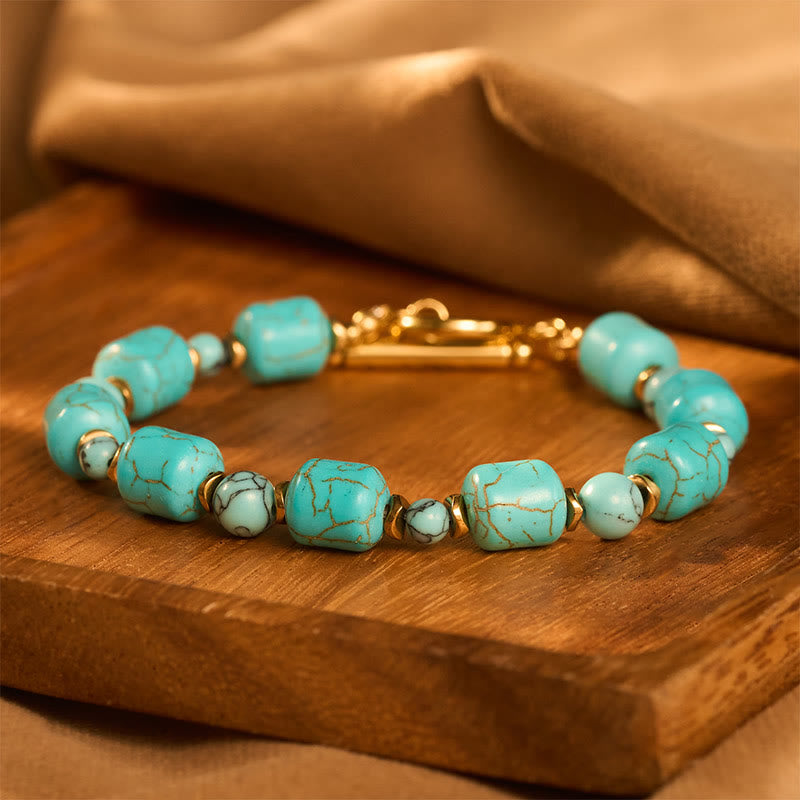 Vintage Boho Armband mit türkisfarbenen Fassperlen und goldfarbenem Knebelverschluss - Blau - image 0