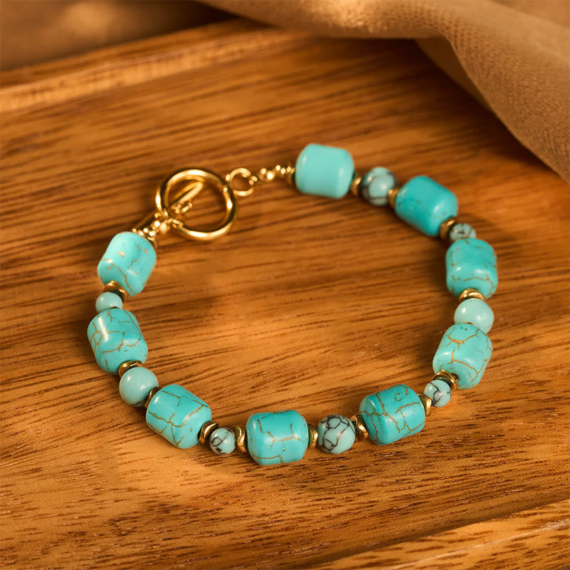 Vintage Boho Armband mit türkisfarbenen Fassperlen und goldfarbenem Knebelverschluss - image 2