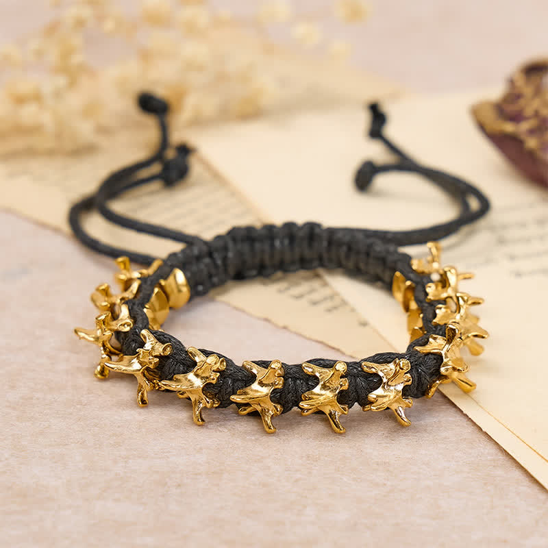 Armband aus geflochtener Drachenwirbelkette - Schwarz & Gold - image 0