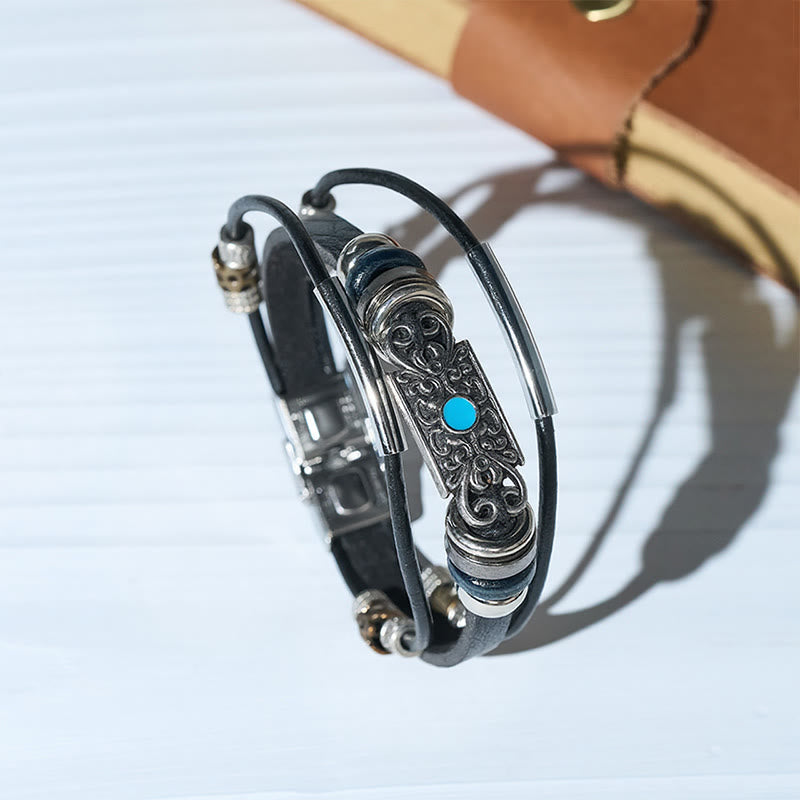 Vintage-Armband für Herren aus Leder im Westernstil mit blauem Stein und Filigranmuster - image 0