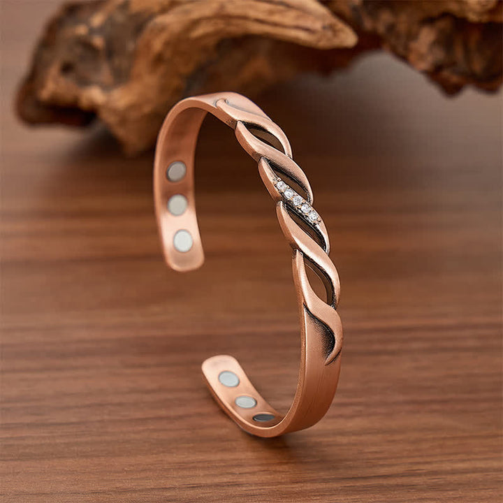 Funkelndes magnetisches Armband mit Infinity-Drehverschluss - Rotbronze - image 0