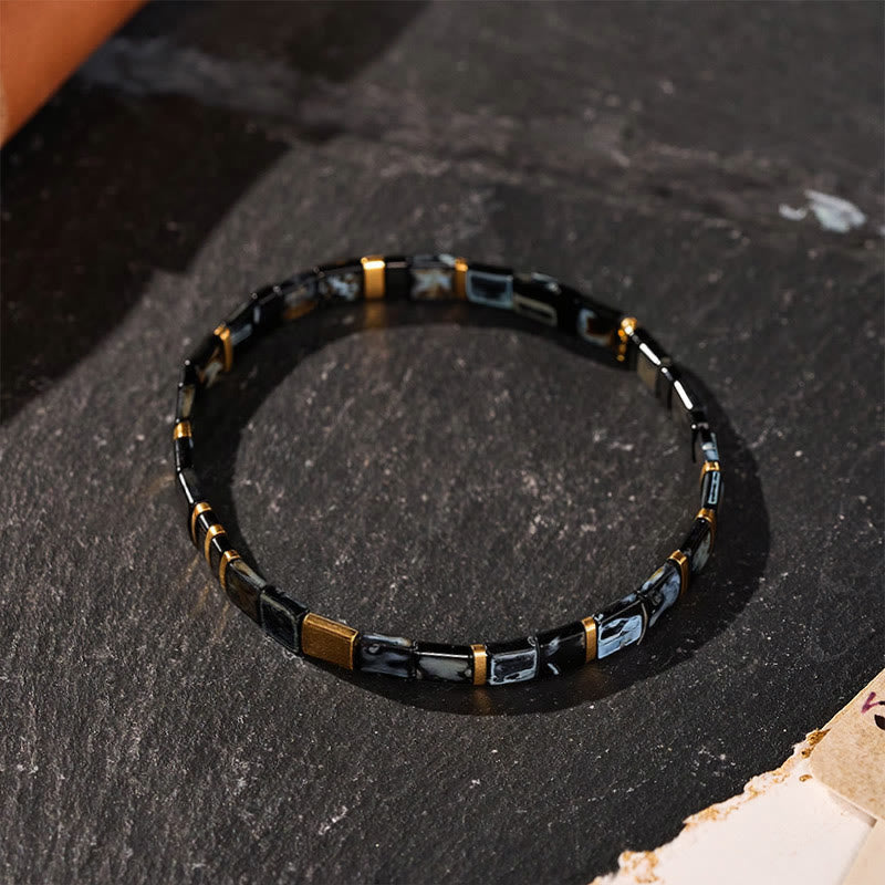 Vintage-Armband aus schwarzem und goldenem Tila-Perlen - image 0