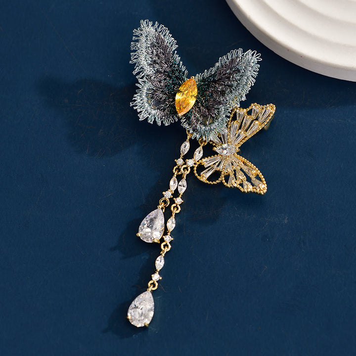 Elegante blaue Schmetterlingsquastenbrosche für Frauen
