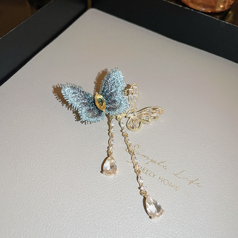 Elegante blaue Schmetterlingsquastenbrosche für Frauen