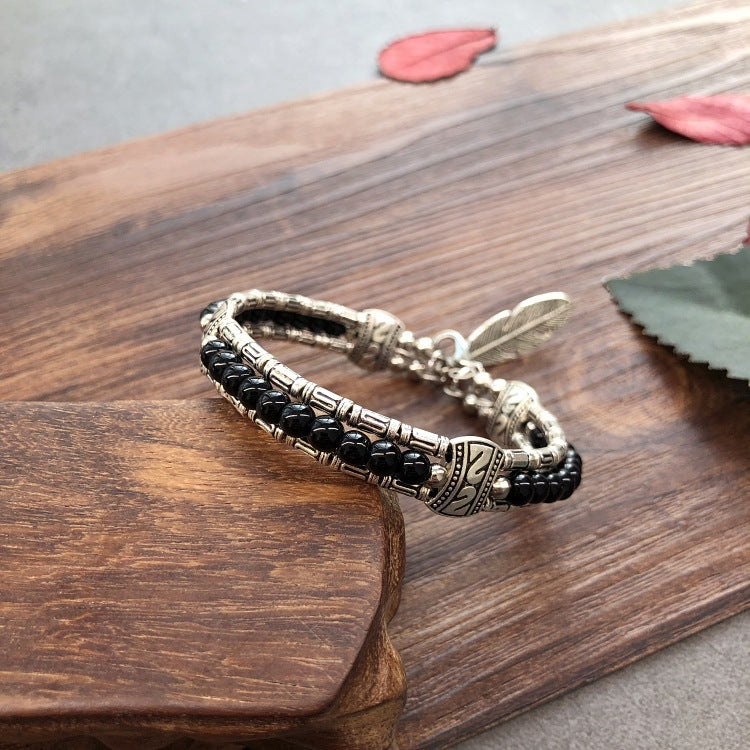 Vintage Boho Armreif mit rundem, mehrfarbigem Stein und silberfarbenem Federanhänger, verstellbar - Schwarz - image 5