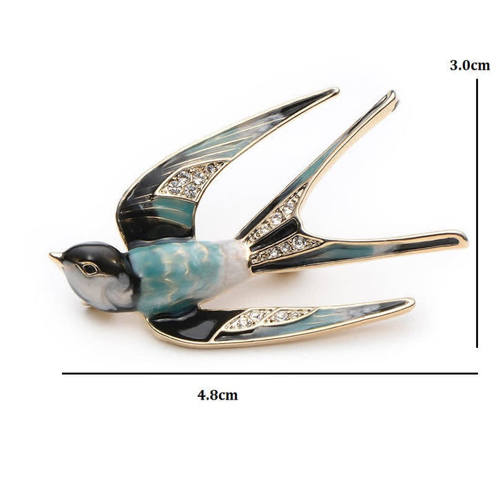 Niedliche Damenbrosche mit Emaille-Schwalbe